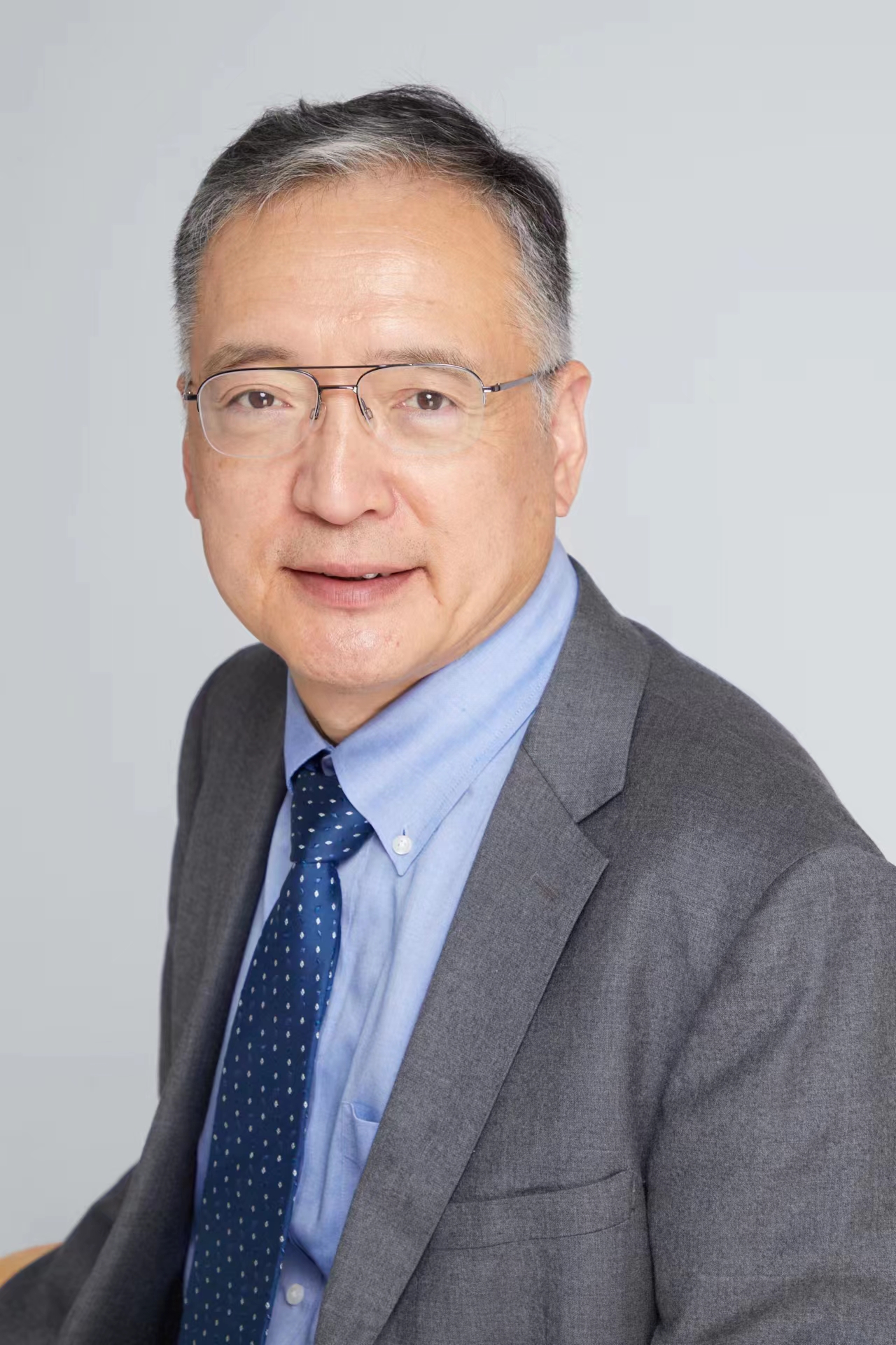 Prof. De-Zheng Sun